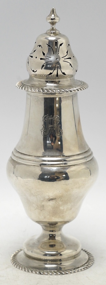 A George V silver inverted pear shaped pedestal sugar caster, Charles Stuart Harris & Sons, London, 1911, 21.6cm, 6.5oz. Condition - fair